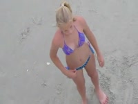 Tanned and toned eighteen year old petite girl captured by voyeur as she walks in her bikini